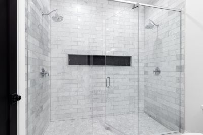 Double Shower Heads in a Spacious Walk-in